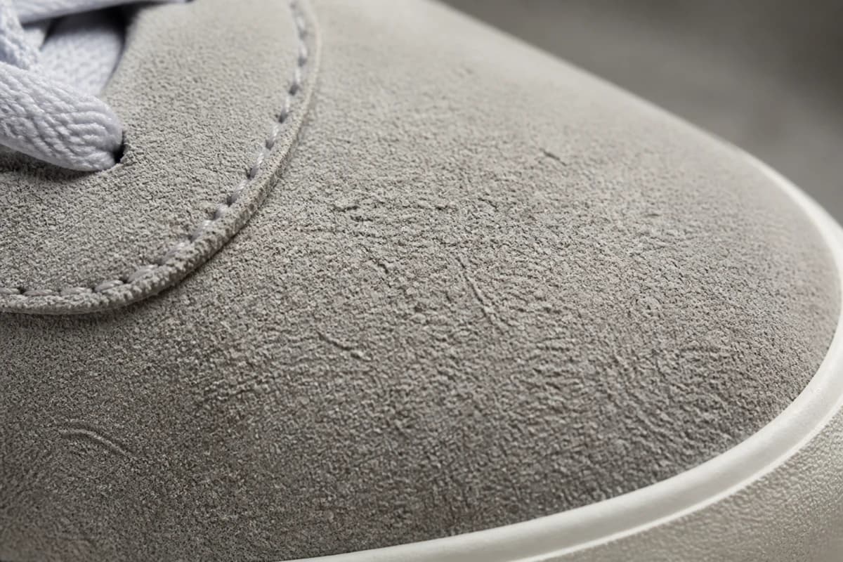 Macro nap detail for sneaker stain removal Dubai assessment on pale grey suede
